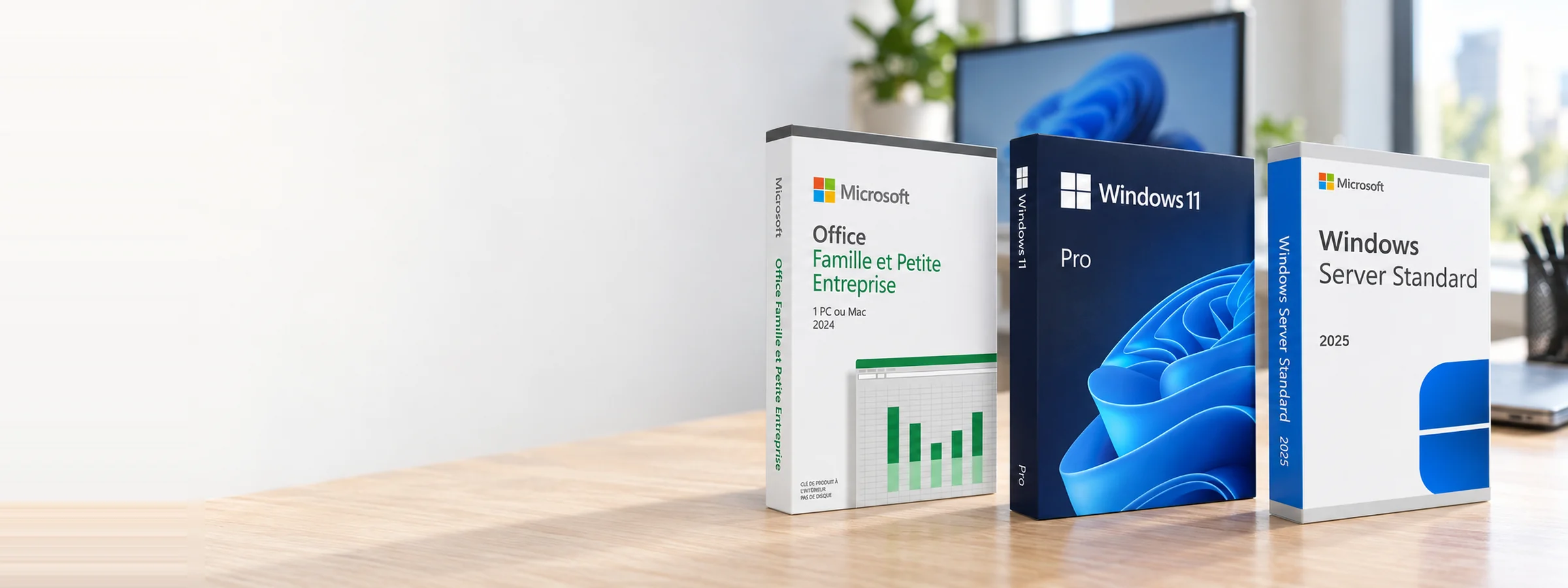 Boîtes Microsoft Office 2024, Windows 11 Pro et Windows Server Standard 2025 posées sur un bureau